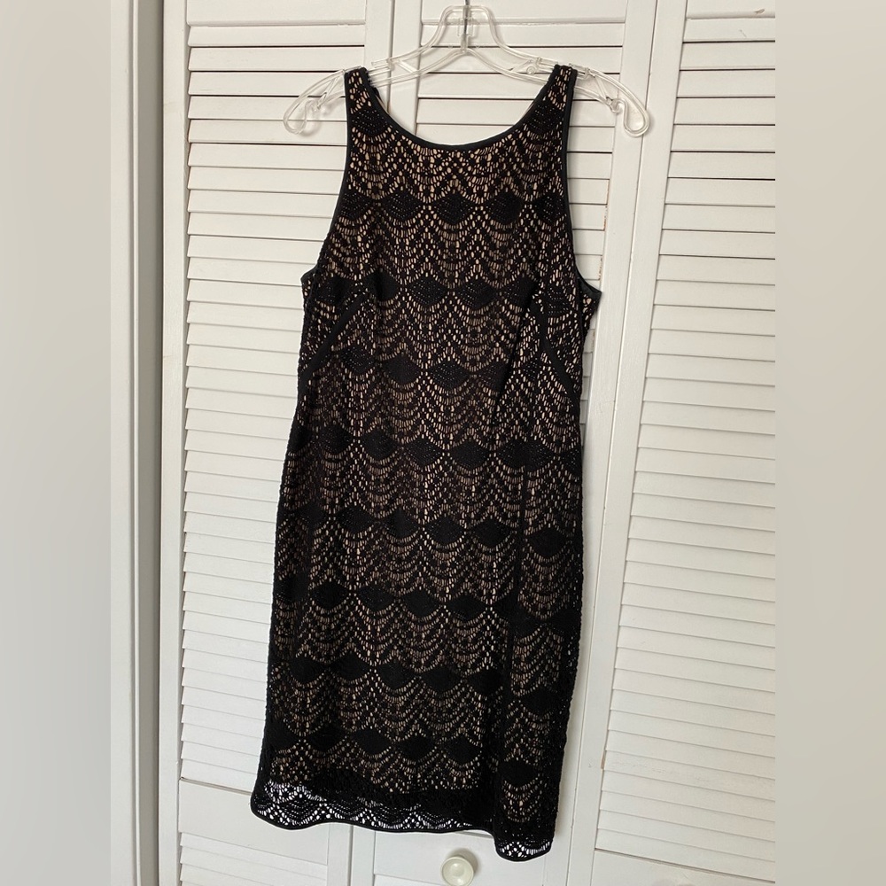 Crochet knee high black dress.